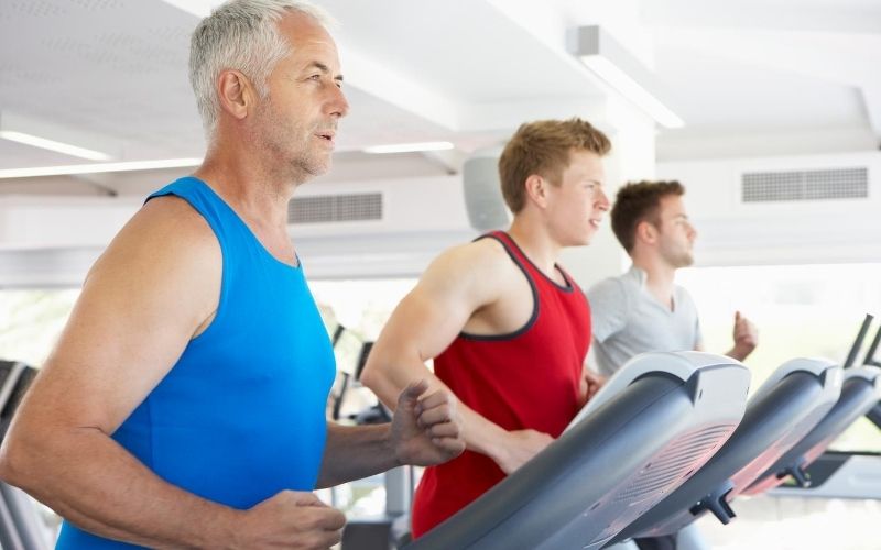 Men running on treadmills.