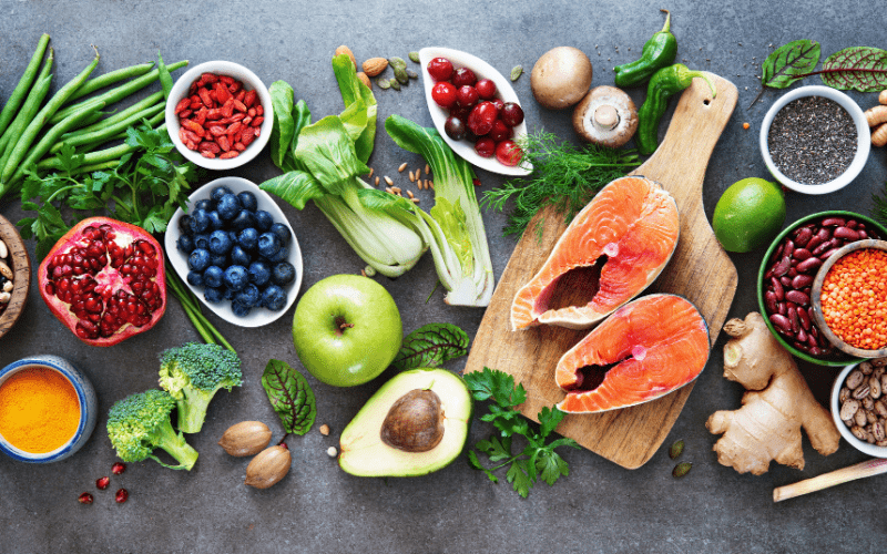 Assorted veggies and fruits on a table