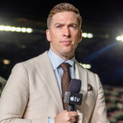 Kevin Egan in front of stadium lights at the World Cup