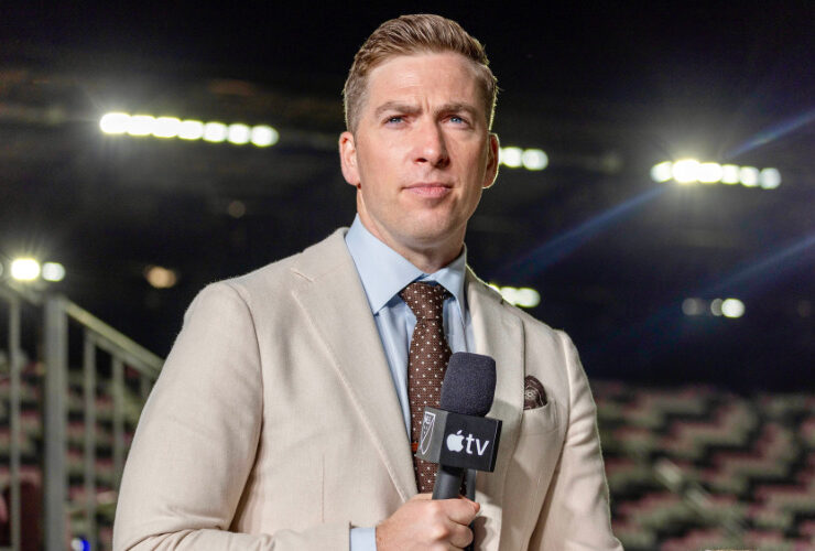 Kevin Egan in front of stadium lights at the World Cup