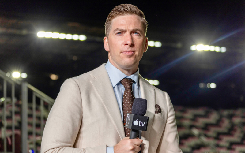 Kevin Egan in front of stadium lights at the World Cup