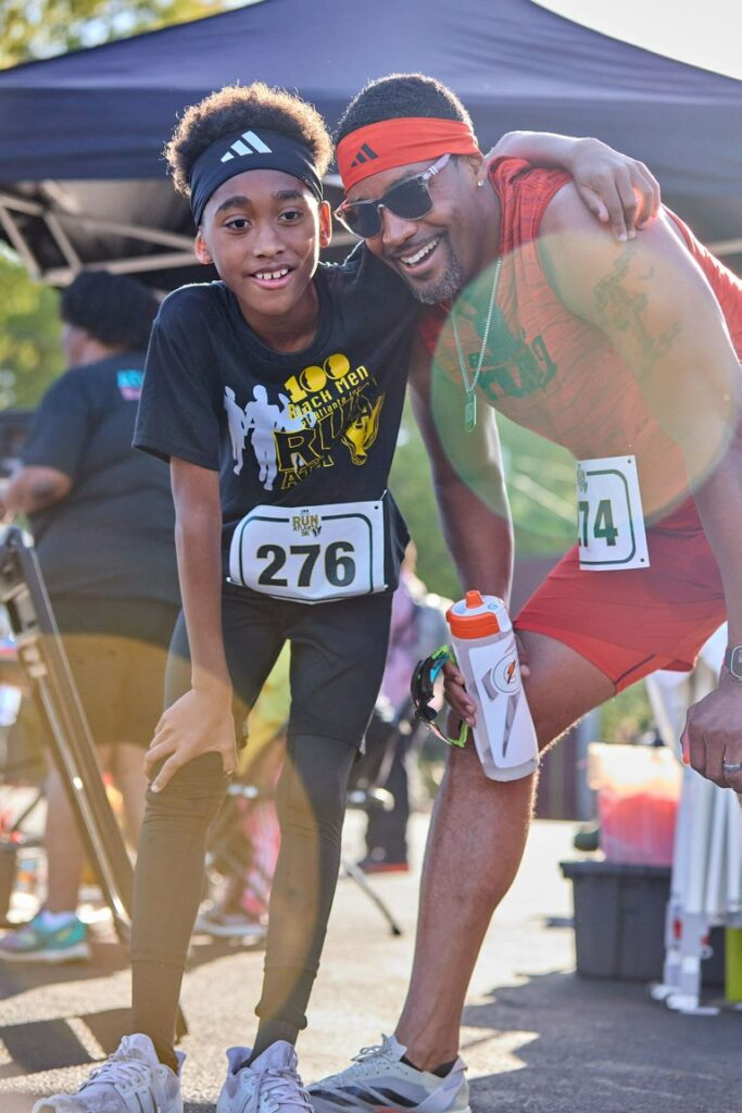 Ronnel with son at race